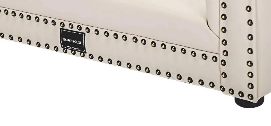 Nailhead rail and turned feet