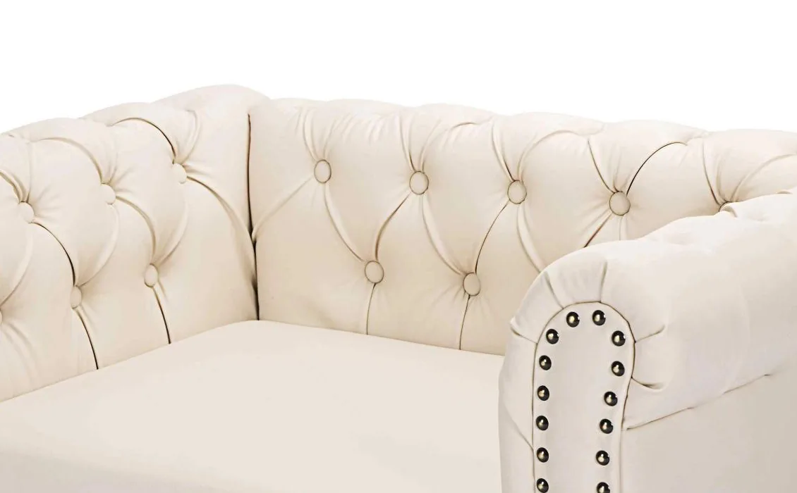 Tufted back and nailhead trim up close